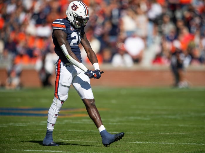 Auburn Tigers safety Smoke Monday (21) celebrates a pass breakup against Mississippi State at Jordan-Hare Stadium in Auburn, Ala., on Saturday, Nov. 13, 2021. Aumsu03